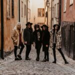 GLAM ROCK TRENCH DOGS TAKE IT UP A NOTCH ON SOPHOMORE ALBUM