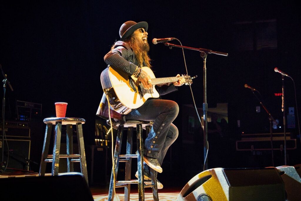 JOHN CORABI AT THE RYMAN: WEAVING SONGS & TALES FROM HIS JOURNEYS